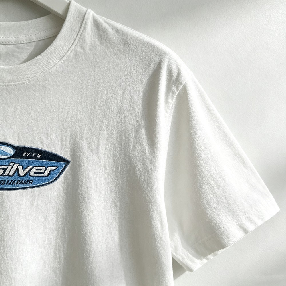 レトロサーフブランドのオーバルロゴグラフィックTシャツ、ユニ - Streetwear Brand Label のレビューと価格